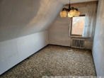 Schlafzimmer I im Dachgeschoss - Einfamilienhaus in Börger! Viel Platz für handwerkliches Geschick!