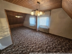Schlafzimmer III im Dachgeschoss - Bild II - Einfamilienhaus in Börger! Viel Platz für handwerkliches Geschick!