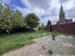 Blick in den Garten - Wohnhaus mit 2 Wohnungen und Büro in Klein Berßen!