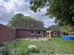 Rückansicht - Wohnhaus mit 2 Wohnungen und Büro in Klein Berßen!