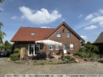 Rückansicht - Geräumiges Einfamilienhaus / Zweifamilienhaus - Surwold - Stadtgrenze Papenburg - Traumgrundstück ca. 16.728 m²