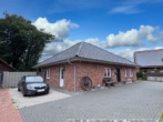 Vorderansicht - Neuwertiger Walmdachbungalow in Werlte - ebenerdig wohnen!