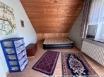Schlafzimmer II im Dachgeschoss - Einfamilienhaus in Sögel! Viel Platz für die ganze Familie!